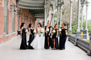 Modern Romantic Glam Bridal Party, Bridesmaids in Black Mix and Match Dresses Holding White Flower Bouquets, Bride Wearing Lace Wedding Dress | Tampa Bay Wedding Photographer Lifelong Photography Studio | Wedding Hair and Makeup Femme Akoi Beauty Studio