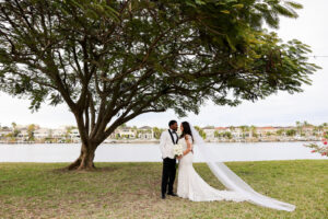 Modern Romantic Glam Bride and Groom Waterfront Wedding Portrait | Tampa Bay Wedding Photographer Lifelong Photography Studio | Wedding Venue Davis Islands Garden Club