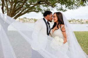 Modern Romantic Glam Bride and Groom Veil Waterfront Wedding Portrait | Tampa Bay Wedding Photographer Lifelong Photography Studio | Wedding Venue Davis Islands Garden Club