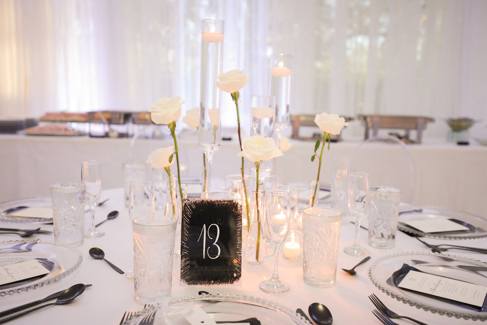 Modern Romantic Glam Wedding Reception Decor, Floating Candles, Single White Roses, Black Table Number | Tampa Bay Wedding Photographer Lifelong Photography Studio