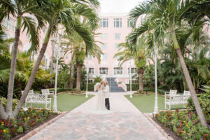 Elegant Blush Pink Same Sex Wedding, Brides Outside Historic Pink Palace St. Pete Wedding Venue The Don Cesar | Tampa Bay Wedding Photographer Amanda Zabrocki Photography