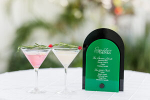 Winter Modern Whimsical Wedding Reception Decor, Acrylic Black Arched and Emerald Green Signature Drinks Menu Signs, Martini Glasses with Pine Spring and Winter Berry | Tampa Bay Wedding Planner MDP Events Planning