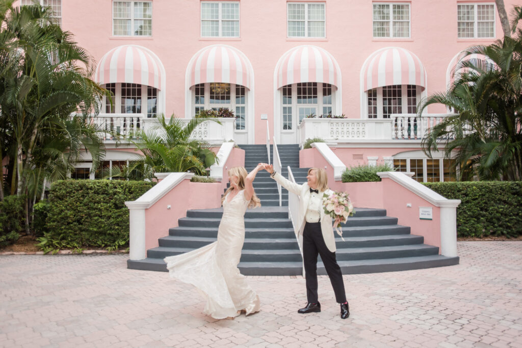 Elegant Blush Pink Same Sex Wedding, Brides Outside Historic Pink Palace St. Pete Wedding Venue The Don Cesar | Tampa Bay Wedding Photographer Amanda Zabrocki Photography