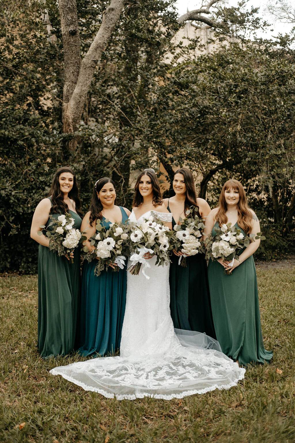 Bride with Bridesmaids in Emerald Green Mix and Match Floor Length Dress with White Flower Bouquets | Wedding Planner Eventfull Weddings