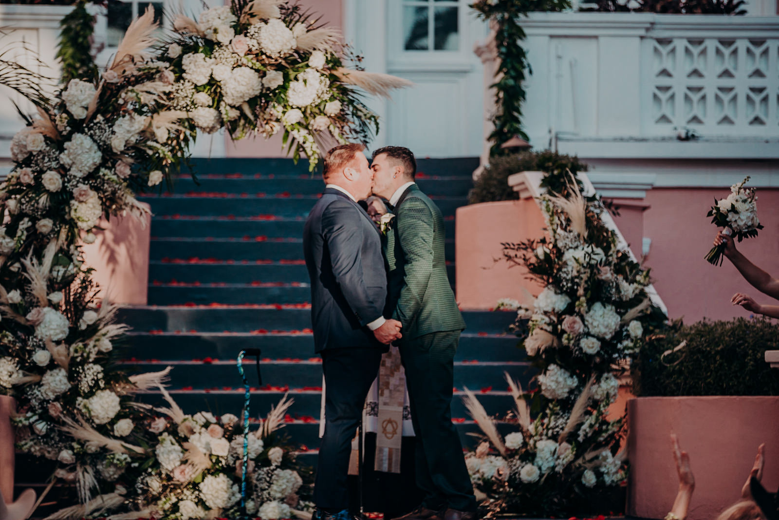Grooms First Kiss at the Alter on Wedding Day Portrait | St. Petersburg Wedding Planner Coastal Coordinating