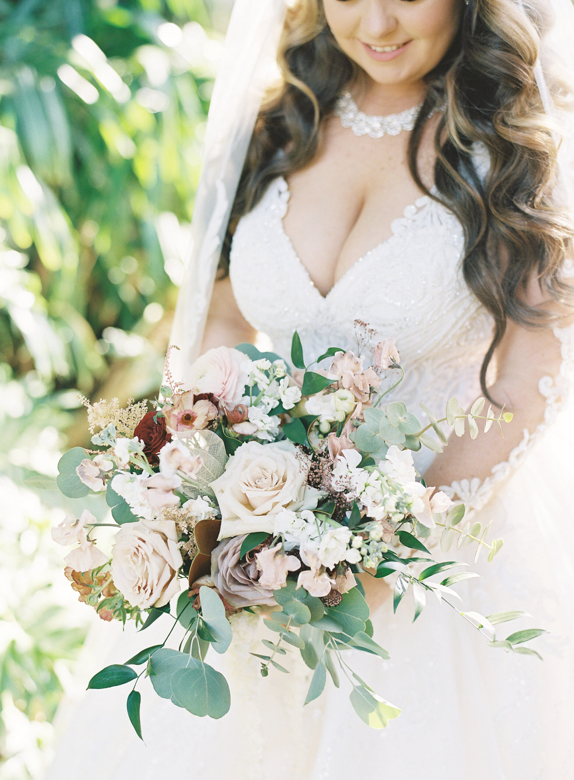 Royal Glam Gatsby Bride Wedding Beauty Portrait Holding Lush Mauve, Blush Pink Roses with Greenery Eucalyptus Floral Bouquet