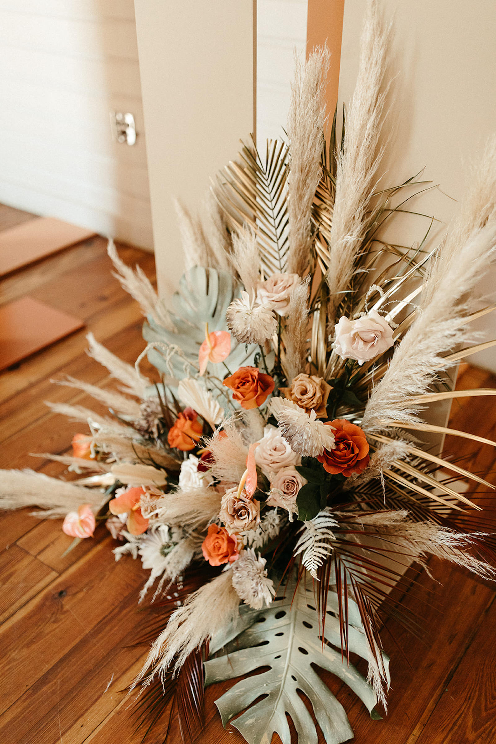 Earthy Neutral Boho Modern Chic Wedding Ceremony Decor, Lush Floral Bouquet, Pampas Grass, Dried Leaves, Monstera Leaves, Terracottaa and Mauve Roses | Tampa Bay Wedding Florist Save the Date Florida