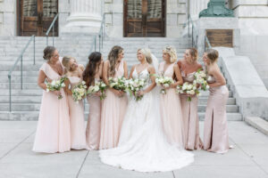 Modern Romantic Bridal Party, Bride Wearing Ballgown Lace Applique and Tulle Wedding Dress, Bridesmaids Wearing Mix and Match Blush Pink Bridesmaids Dresses Outside Wedding Venue Le Meridien | Tampa Bay Wedding Attire Bella Bridesmaids