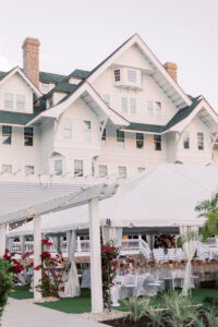 Vintage, Classic Southern Outdoor Wedding Reception Decor, White Tent, Red Flowers | Tampa Bay Wedding Planner Parties A'la Carte | Belleaire Wedding Venue Belleview Inn