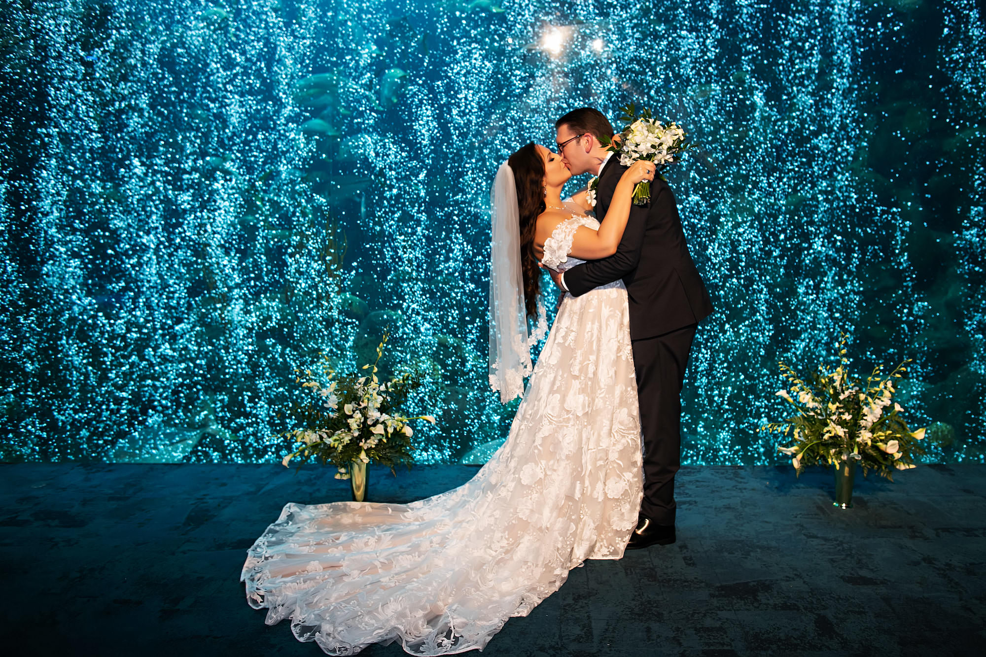 Bride and Groom First Kiss | Tampa Florida Aquarium Indoor Wedding | Tampa Florida Photographer Limelight Photography