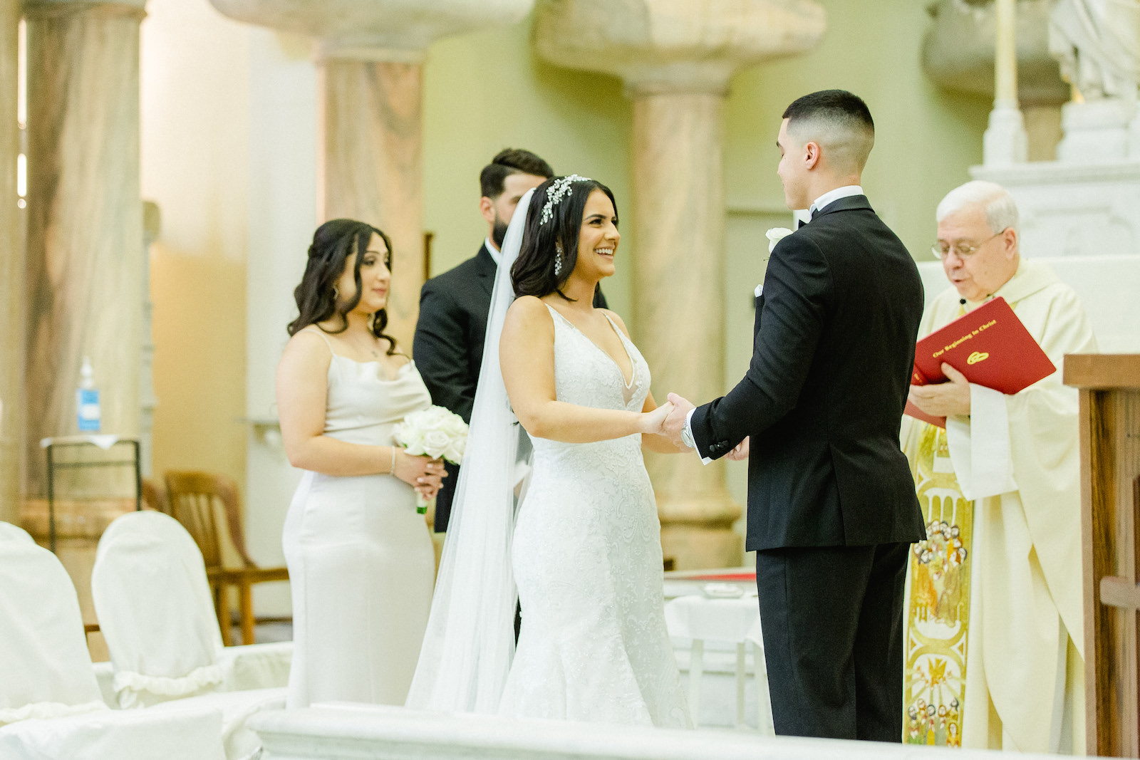 Romantic Bride and Groom Wedding Ceremony Vow Exchange During Traditional Church Wedding
