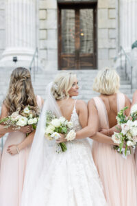 Modern Romantic Bridal Party, Bride Wearing Ballgown Lace Applique and Tulle Wedding Dress, Bridesmaids Wearing Mix and Match Blush Pink Bridesmaids Dresses Outside Wedding Venue Le Meridien | Tampa Bay Wedding Attire Bella Bridesmaids