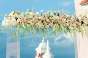 Elegant Blush Pink Same Sex Wedding, Modern Acrylic Arch with Lush Floral Arrangement, Hanging Greenery, White Hydrangeas, Blush Pink and Ivory Roses | Tampa Bay Wedding Photographer Amanda Zabrocki Photography | Clearwater Wedding Planner Elegant Affairs by Design | Wedding Florist Save the Date Florida | Rooftop Beach Waterfront St. Pete Wedding Venue The Don CeSar