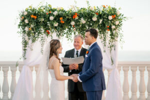 Bride and Groom Exchange Vows | Rooftop Waterfront Wedding Ceremony Hyatt Regency Clearwater Beach | Wedding Photographer Dewitt for Love