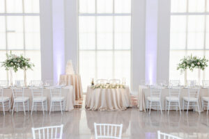 Modern Romantic Wedding Reception Decor, Champagne Table lInens, White Chiavari Chairs, Greenery and White Floral Bouquets | Tampa Bay Historic Wedding Venue The Vault
