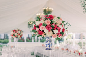 Vintage Southern Classic Wedding Reception Decor, Outdoor White Tent, Tall Acrylic Stand with White and Blue Ceramic Vase with Pink and White Roses with Greenery Floral Arrangement | Tampa Bay Wedding Florist Bruce Wayne Florals | Wedding Planner Parties A'la Carte