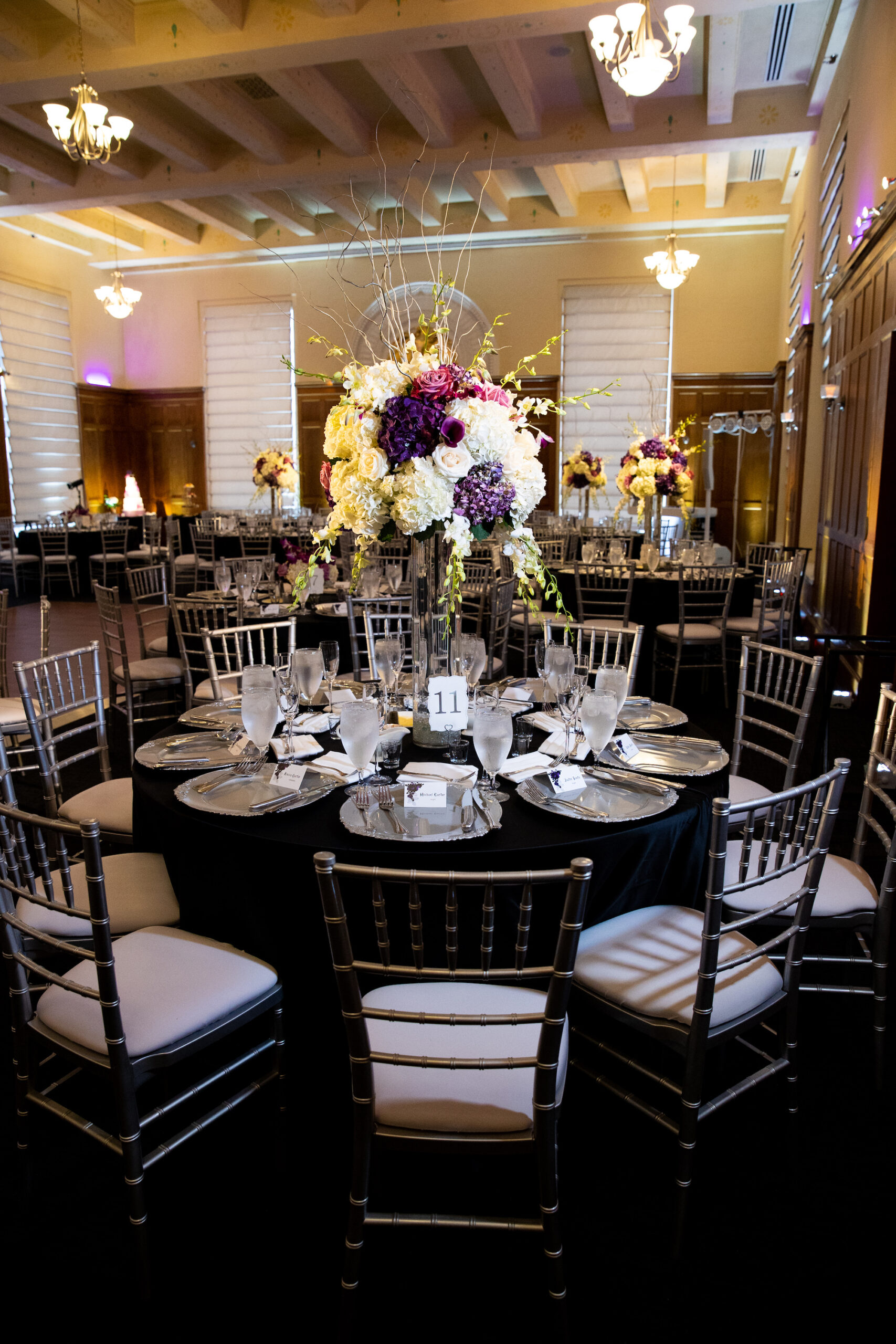 Wedding Reception with Silver Chiavari Chairs and Tall Purple and White Centerpieces | Fall Wedding Inspiration | | Tampa Event Rentals Gabro Event Services | Venue Le Meridien