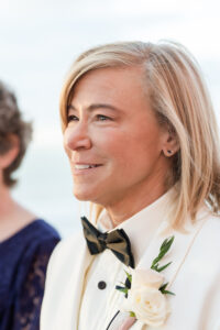 Rooftop Elegant Blush Pink Same Sex Wedding, Bride Wearing White Tuxedo with Black Bowtie | Tampa Bay Wedding Photographer Amanda Zabrocki Photography