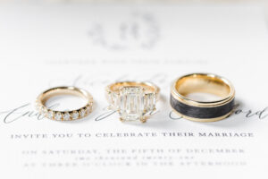 Emerald Cut Three Stone Yellow Gold Diamond Engagement Ring, Bride Diamond and Yellow Gold Wedding Ring, Groom Black and Yellow Gold Wedding Ring | Wedding Jewelry International Diamond Center