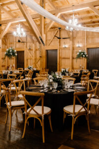 Barn Wedding Reception with Rustic Detail and Black Tablecloths | Florida Rentals FH Events | Mision Lago Ranch