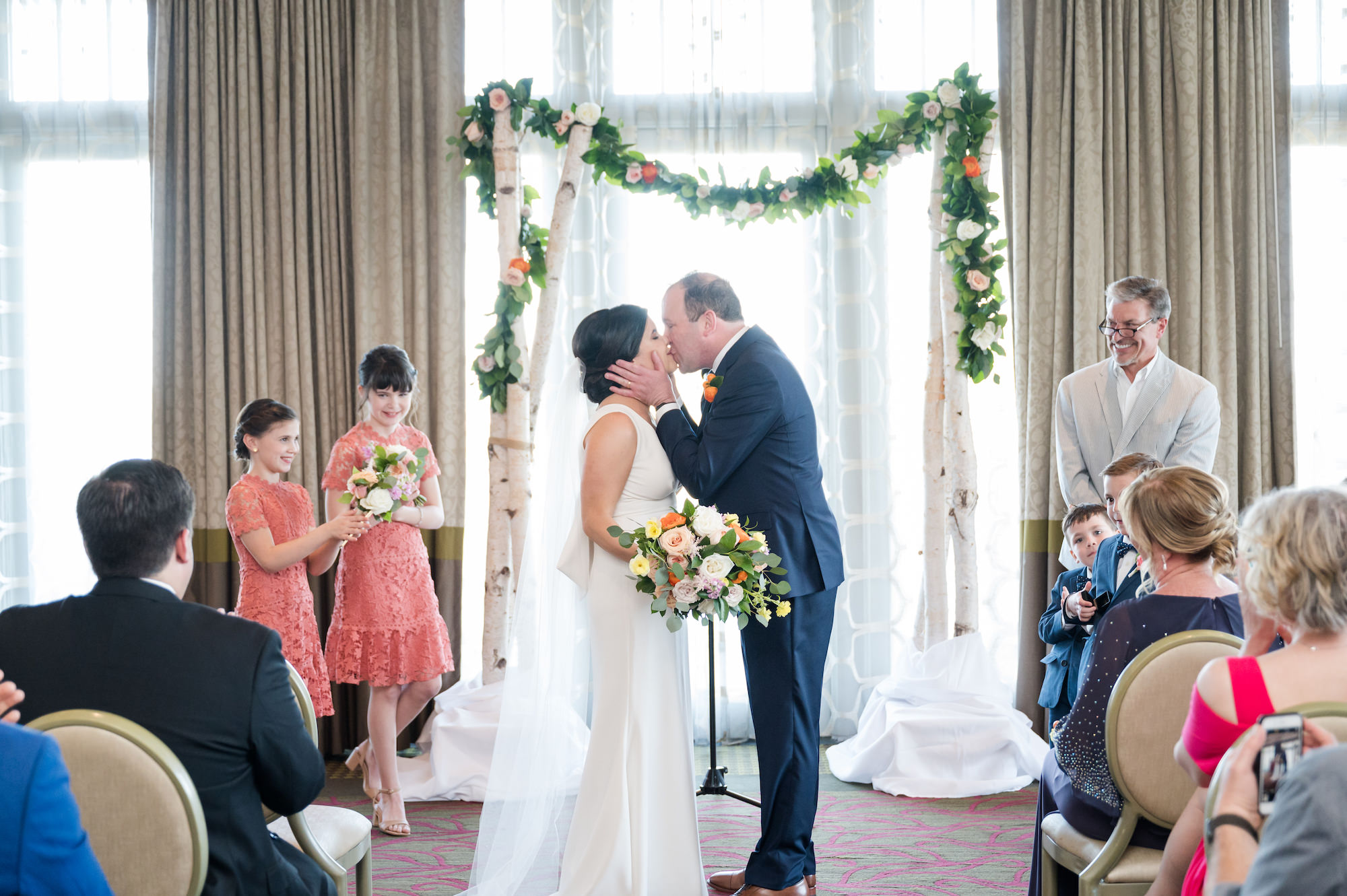 Bride and Groom Kiss in Ballroom Wedding Ceremony | St. Pete Venue The Birchwood