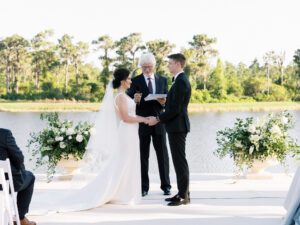 Old Florida Elegant Bride and Groom Exchanging Wedding Vows During Outdoor Wedding Ceremony