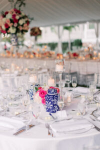 Vintage Southern Classic Wedding Reception Decor, Blue and White Ceramic Vase, Pink and White Roses Low Floral Centerpieces, High and Low Candlesticks | Tampa Bay Wedding Planner Parties A'la Carte | Clearwater Wedding Rentals Gabro Event Services, Over the Top Rental Linens | Wedding Florist Bruce Wayne Florals