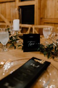 Black Acrylic Table Numbers with Clear Gold Rim Chargers Place Setting
