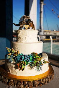 Three Tier White Cake with Tropical and Dinosaur Details