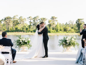 Old Florida Elegant Bride and Groom Exchanging Wedding Vows During Outdoor Wedding Ceremony