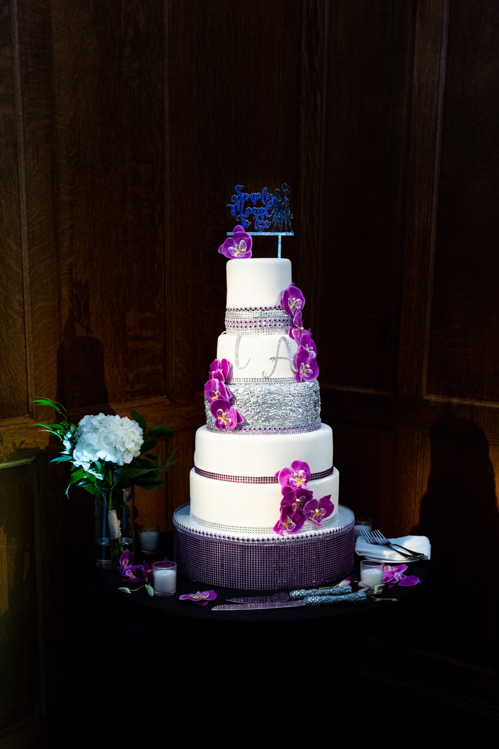 5 Tier Round White Wedding Cake with Purple Orchid Flowers and Silver Rhinestones