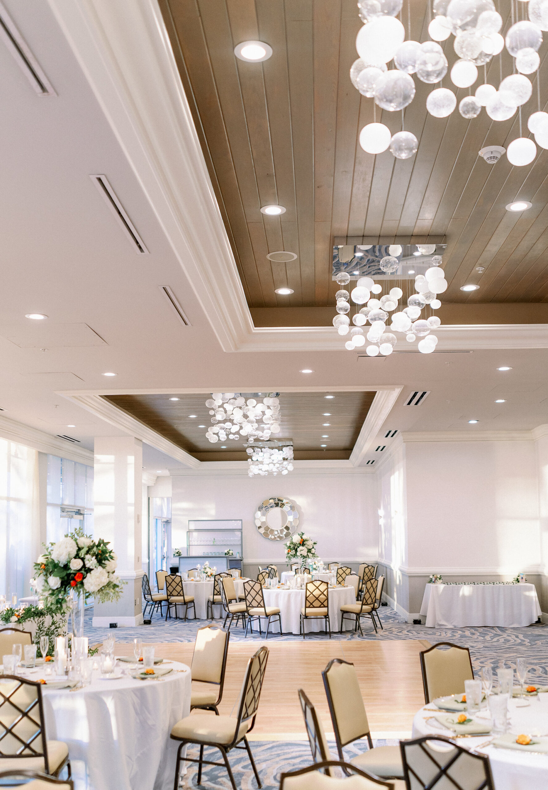 Hotel Ballroom Wedding Reception with White Walls and Tropical Detailing and Decor | Reception Venue Hyatt Regency Clearwater Beach | Clearwater Wedding Rentals Kate Ryan Event Rentals