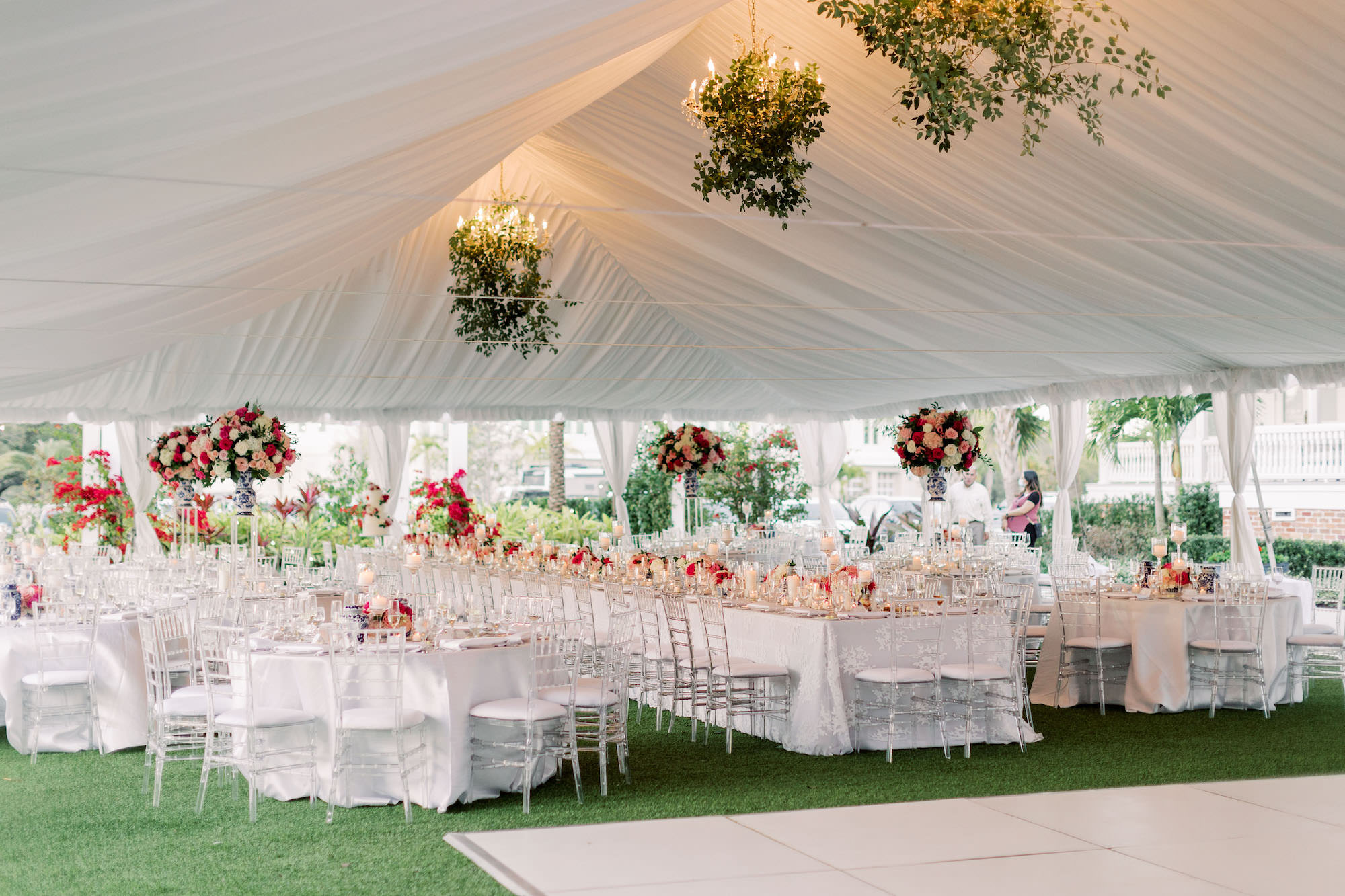 Vintage Blue and Pink Southern Classic Wedding Reception Decor, Outdoor White Tent, Long Feasting Tables, Clear Acrylic Chiavari Chairs, Greenery Hanging Chandeliers | Tampa Bay Wedding Planner Parties A'la Carte | Wedding Rentals Gabro Event Services | Over the Top Rental Linens