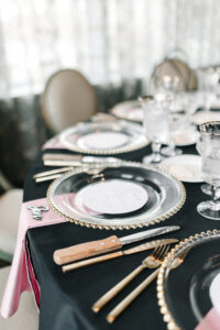 Glass Gold Beaded Wedding Reception Chargers with Black Linens | Tampa Bay Rentals Outside the Box Event Rentals