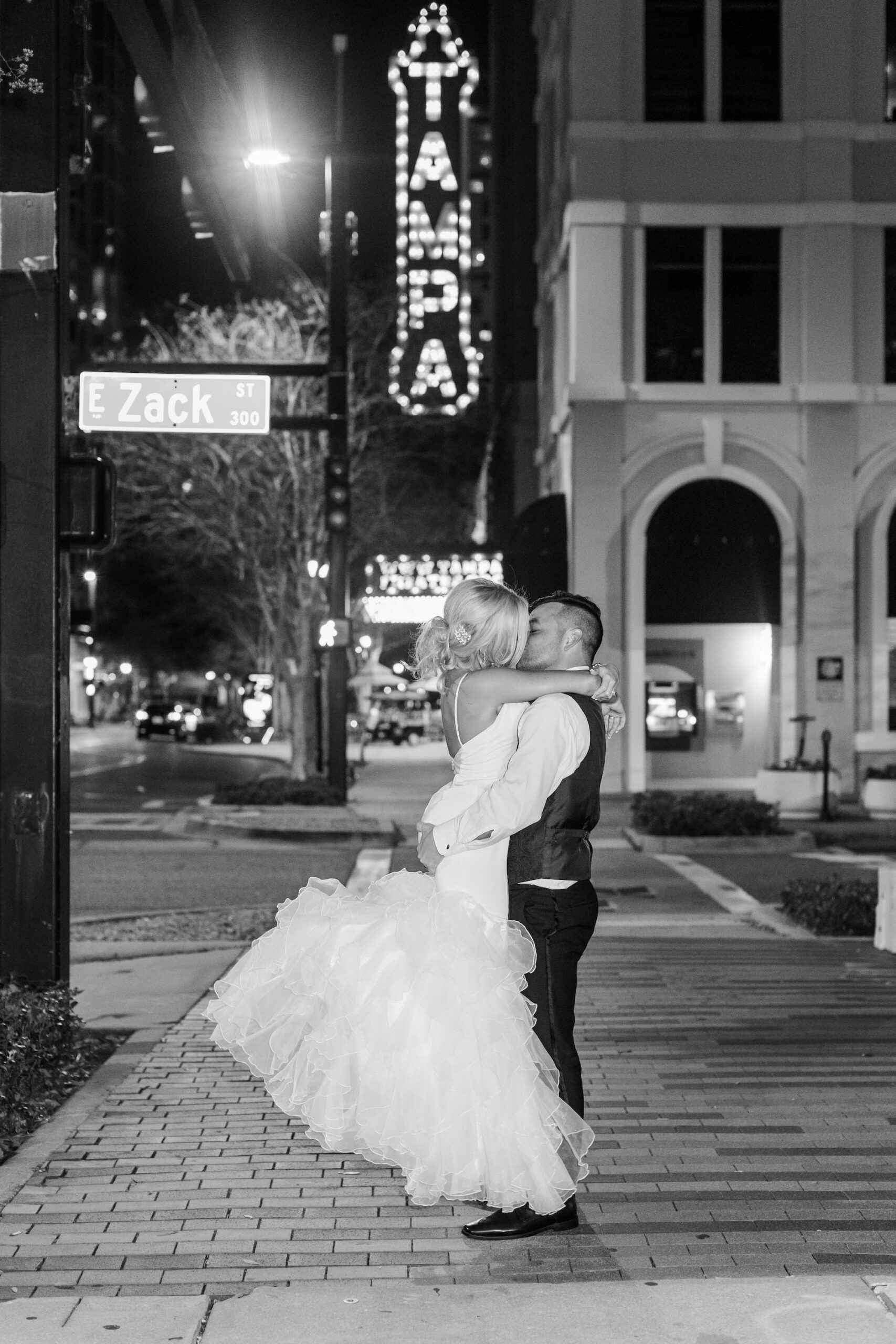 Modern Romantic Downtown Tampa Wedding, Bride and Groom Black and White Kissing Photo