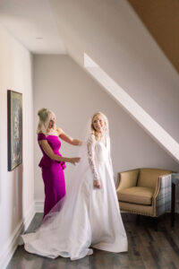 Vintage Bride with Mother Getting Wedding Ready in Silk Ballgown with Lace and Illusion Long Sleeves