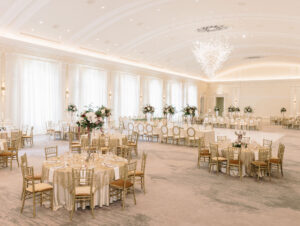 Elegant Royal Glam Gatsby Ballroom Wedding Reception Decor, Round and Long Tables with Gold Chiavari Chairs, Tall Floral Centerpieces, Ivory and Gold Table Linens | St. Pete Wedding Venue The Vinoy Renaissance | Tampa Bay Wedding Rentals Kate Ryan Event Rentals | Wedding Planner and Designer John Campbell Weddings