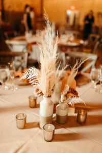Earthy Neutral Boho Modern Chic Wedding Reception Decor, Low Mix and Match Vases with Pampas Grass and Dried Leaves, Gold Mercury Glass Votive Candles | Tampa Bay Wedding Planner Wilder Mind Events | Wedding Florist Save the Date Florida