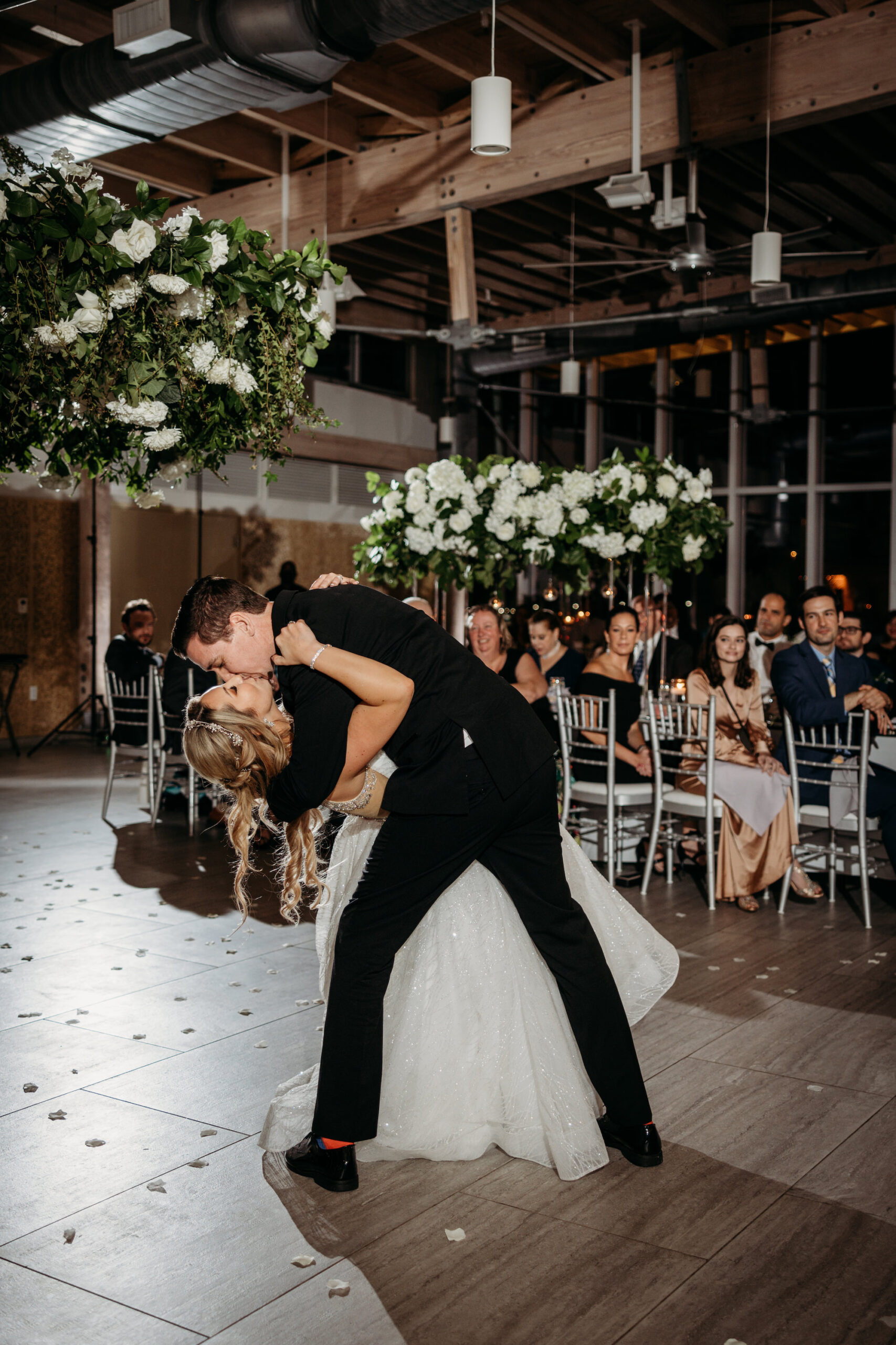 Winter Inspired Wedding Reception, Groom Dip Kissing Bride During Wedding Reception Dance | Tampa Bay Wedding Planner MDP Events