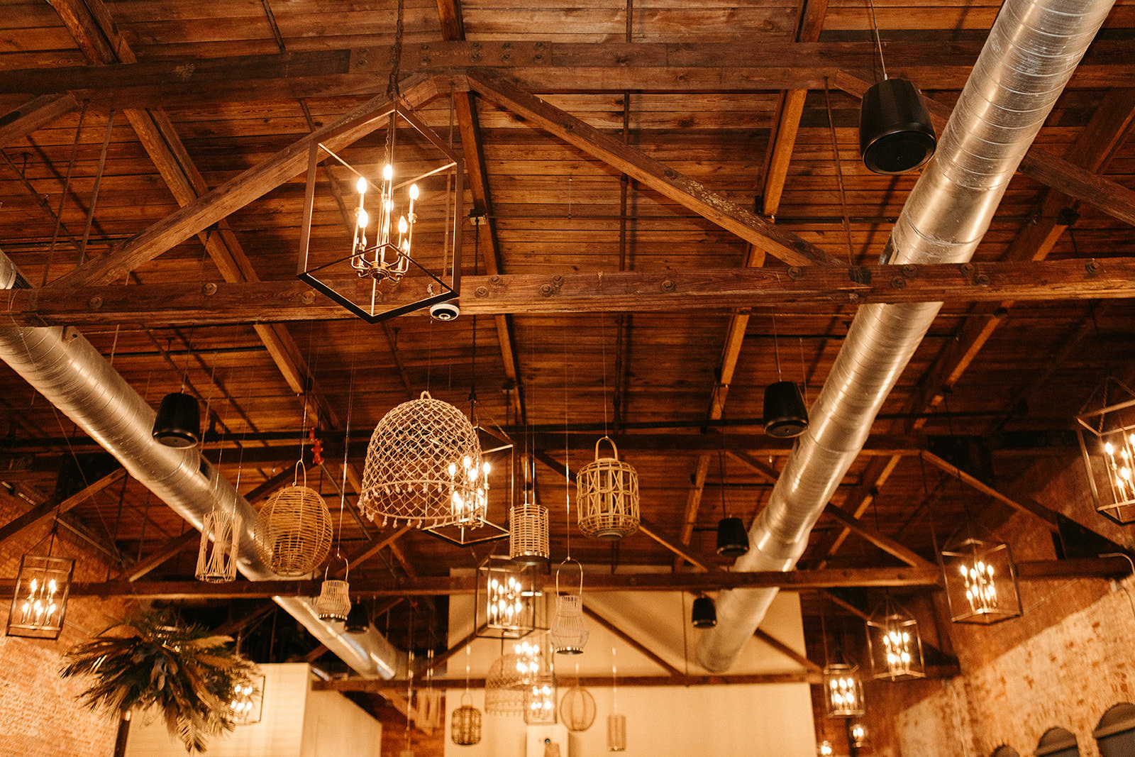 Earthy Neutral Boho Modern Chic Wedding Reception Decor, Mix and Match Wooden, Wicker and Rattan Chandeliers | Tampa Bay Wedding Planner Wilder Mind Events