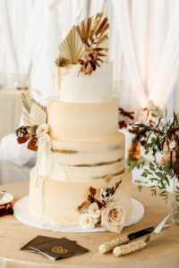 Fall Boho Wedding, Five Tier White Semi Naked Wedding Cake with Dried Leaves and Ivory Roses