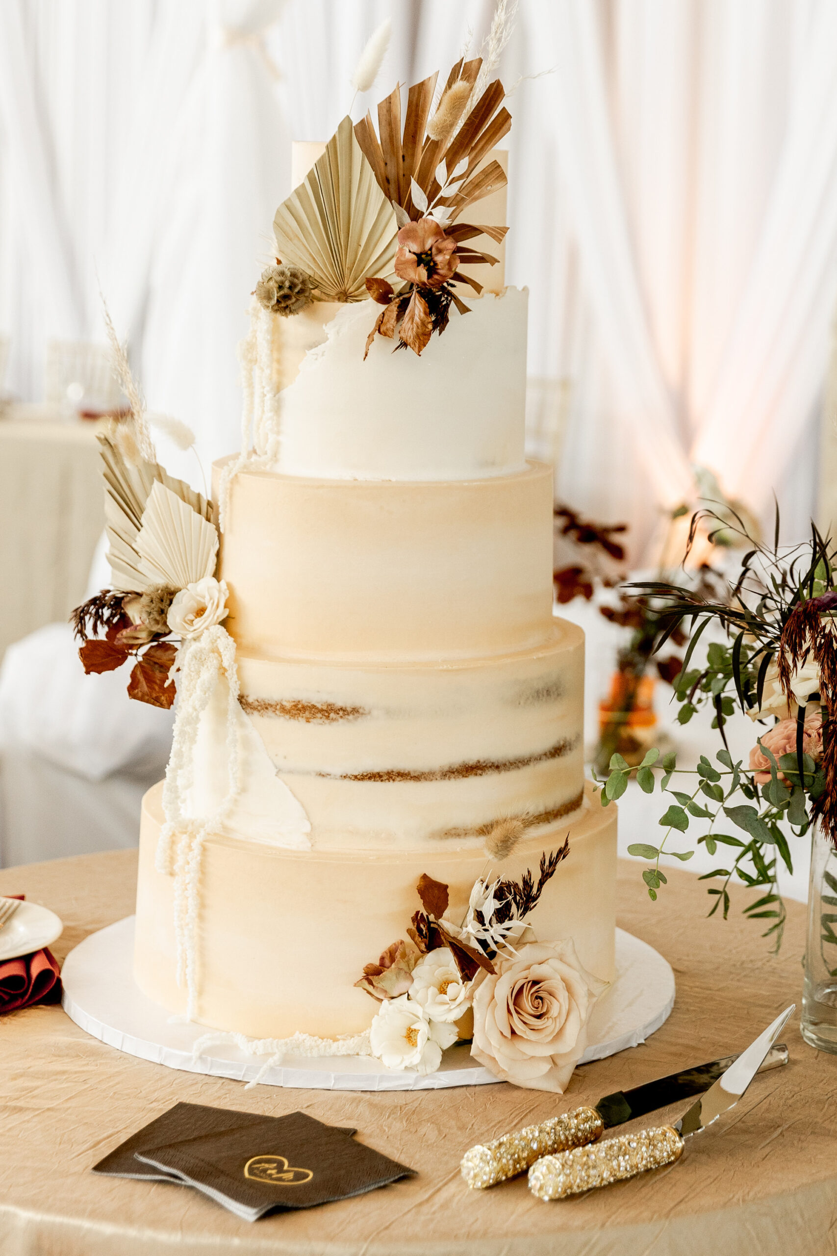 Fall Boho Wedding, Five Tier White Semi Naked Wedding Cake with Dried Leaves and Ivory Roses