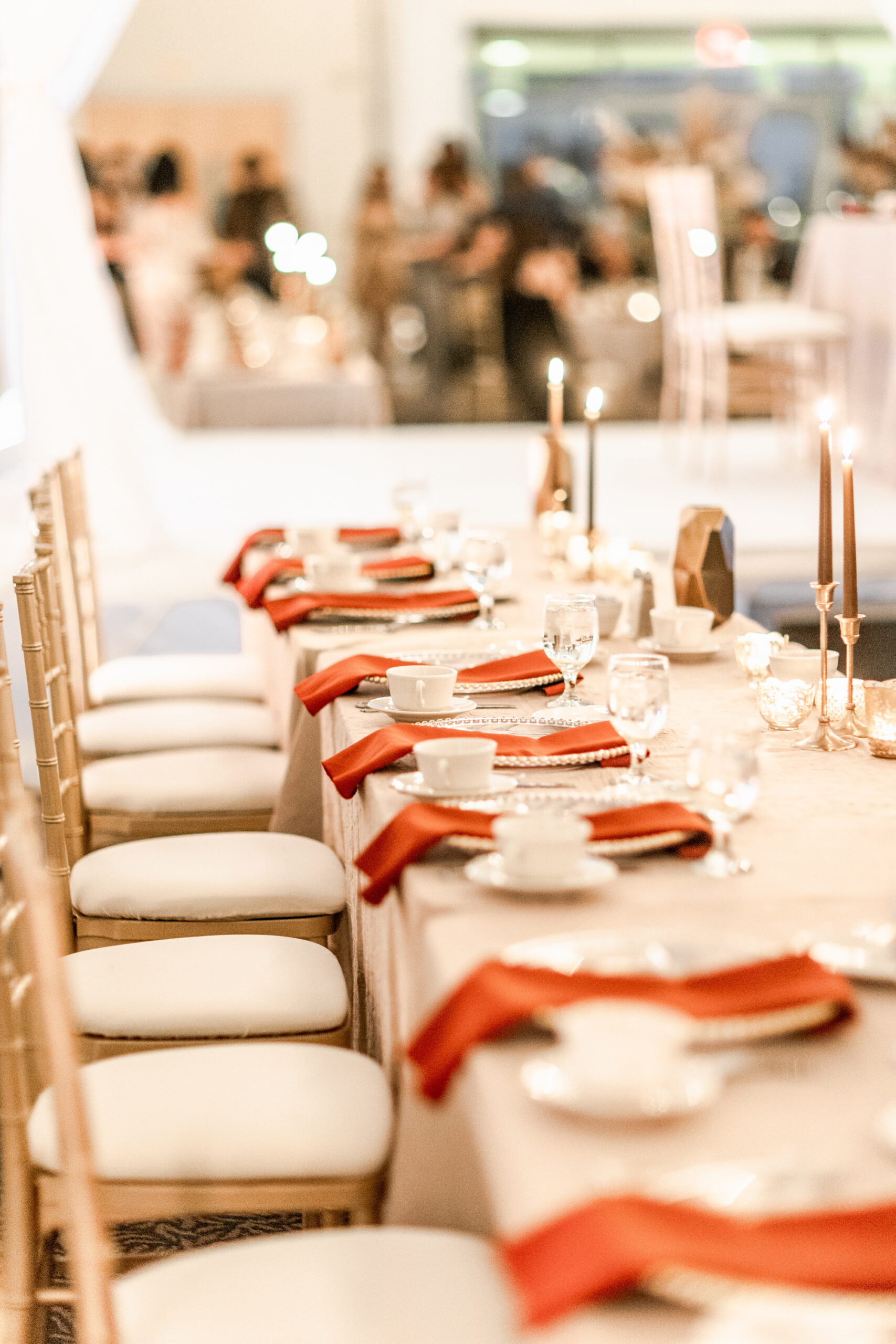 Fall Boho Wedding Reception Decor, Long Feasting Table, Gold Chiavari Chairs, Burnt Orange Linen Napkins | Tampa Bay Wedding Rentals Gabro Event Services
