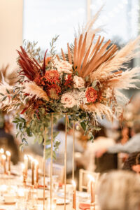 Fall Boho Wedding Reception Decor, Tall Gold Stand with Dried Palm Leaves, Pampas Grass, Burnt Orange and Ivory Flowers, Greenery Centerpiece | Tampa Bay Wedding Rentals Gabro Event Services