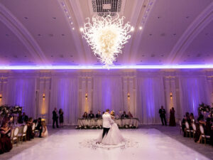 Royal Glam Gatsby Bride and Groom First Dance on White Dance Floor with Custom Gold Monogram | St. Pete Wedding Venue The Vinoy Renaissance