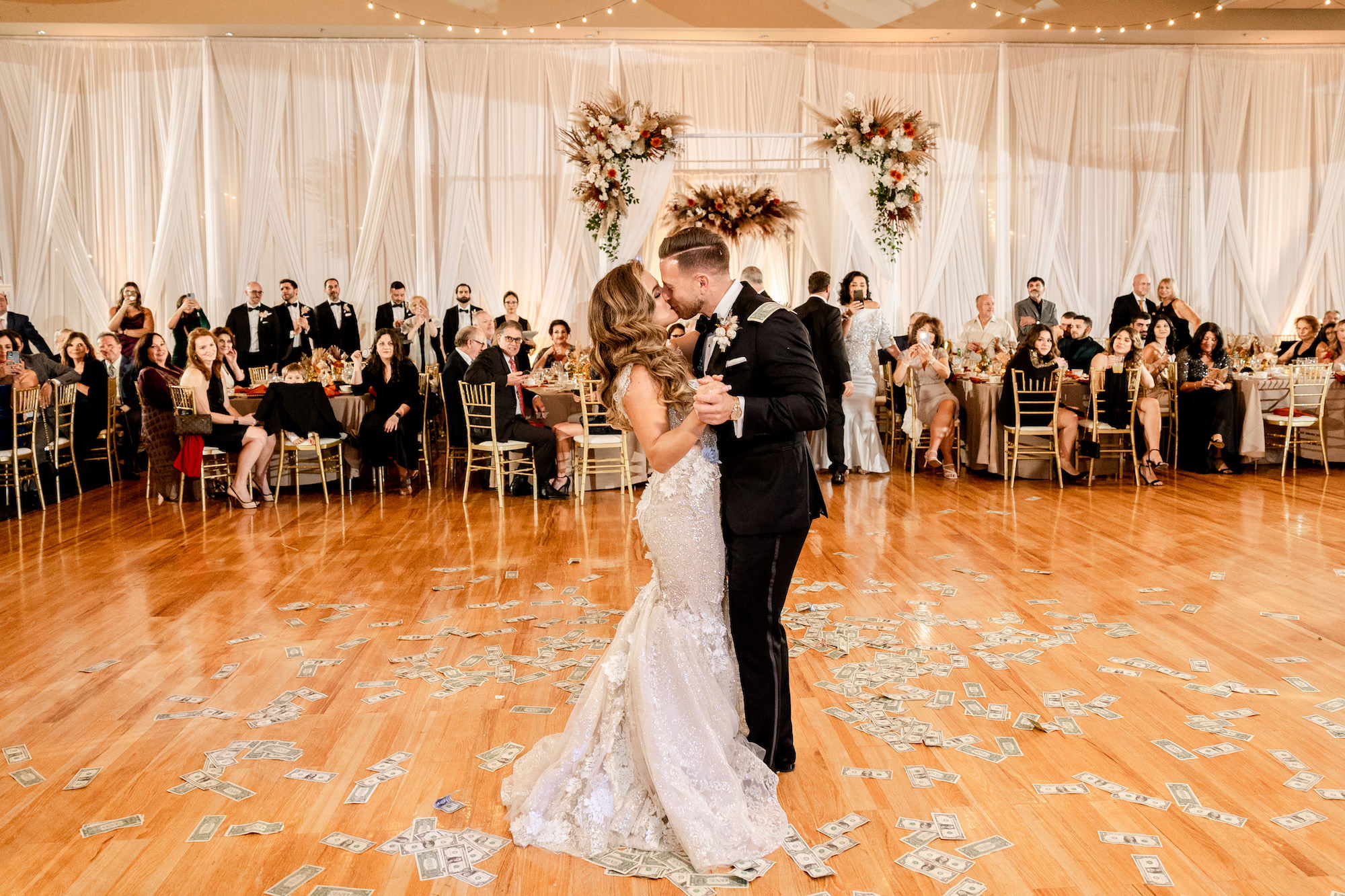 Fall Boho Bride and Groom First Dance with Money All Over Dance Floor