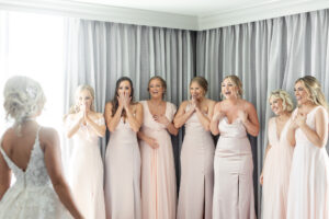 Modern Romantic Bride First Look with Bridesmaids in Mix and Match Blush Pink Dresses | Tampa Bay Wedding Attire Bella Bridesmaids