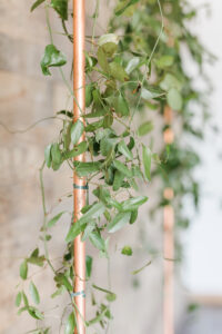 Winter Modern Whimsical Wedding Styled Shoot Ceremony Decor, Copper Rectangular Arch with Greenery Leaves, Black Lanterns, Gold Chiavari Chairs | Tampa Bay Wedding Planner MDP Events Planning