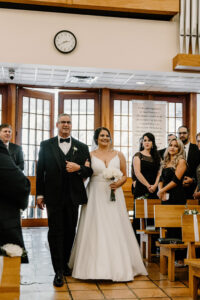 Bride and Father of the Bride Walking Down the Aisle Wedding Portrait |