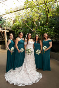 Bride and Bridesmaids with White Florals and Greenery in Teal Long Bridesmaids Dresses | Tampa Florals Brides N Blooms Wholesale and Design